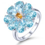 sky blue topaz and citrine halo ring in rhodium over sterling silver