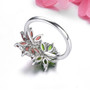 back view of chrome diopside garnet citrine and zircon flower ring in rhodium over sterling silver