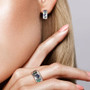 close up of lab created sapphire and spinel butterfly ring in rhodium over sterling silver