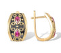 side view of lab ruby earrings in black rhodium and 18k yellow gold over sterling silver