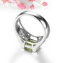 full view of peridot and white zircon bridge ring in rhodium over sterling silver
