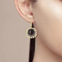 black spinel lab brown spinel and cz halo earrings in 18k yellow gold over sterling silver worn on the ear