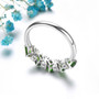 back view of chrome diopside and white zircon band ring in rhodium over sterling silver
