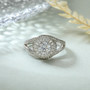 front view of moissanite round bypass double halo ring in rhodium over sterling silver