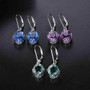 close up of green fluorite dangle earrings in rhodium over sterling silver