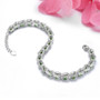 back view of chrome diopside and white zircon halo bracelet in rhodium over sterling silver