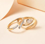 moissanite 2 ring stackable set in 10k yellow gold shown in a lifestyle photo