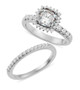 front view of womens moissanite halo bridal set in 10k white gold