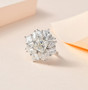 moissanite cluster ring in rhodium over sterling silver worn on a hand
