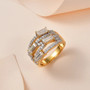 moissanite openwork cluster ring in 18k yellow gold over sterling silver shown in a lifestyle photo