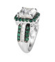 side view of asscher cut moissanite and emerald halo ring in rhodium over sterling silver