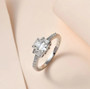 radiant baguette and round cut moissanite wedding ring in 10k white gold shown in a lifestyle photo