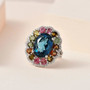 london blue topaz multi tourmaline and zircon ring in rhodium over sterling silver shown in a lifestyle photo