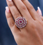 rhodolite garnet and white zircon statement ring in 18k rose gold over sterling silver worn on a hand