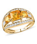yellow sapphire and moissanite trilogy ring in 10k yellow gold