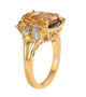 side view of heliodor ring with champagne and white diamonds in 18k yellow gold over sterling silver
