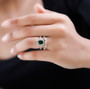 chrome diopside and white zircon two ring bridal set in rhodium over sterling silver worn on a hand