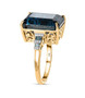 side view of london blue emerald cut topaz blue diamond and white diamond ring in 10k yellow gold