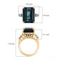 london blue emerald cut topaz blue diamond and white diamond ring in 10k yellow gold shown for size comparison
