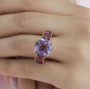 rose de france amethyst and rhodolite garnet ring in 18k rose gold over sterling silver worn on a hand