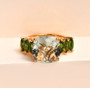 prasiolite and chrome diopside ring in 18k yellow gold over sterling silver shown in a lifestyle photo