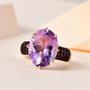 rose de france amethyst and rhodolite garnet ring in 18k rose gold over sterling silver shown in a lifestyle photo