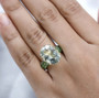 prasiolite and chrome diopside ring in 18k yellow gold over sterling silver worn on a hand