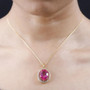 pink and white topaz halo necklace in 18k yellow gold over sterling silver worn around the neck
