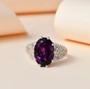 amethyst and moissanite ring in rhodium over sterling silver shown in a lifestyle photo