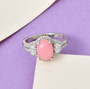 pink opal and moissanite ring in rhodium over sterling silver shown in a lifestyle photo