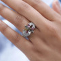 multi tourmaline and white zircon flower ring in rhodium over sterling silver worn on a hand
