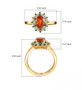 spessartine garnet tsavorite garnet and moissanite halo ring in 18k yellow gold over sterling silver shown for size comparison