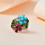 multi gemstone floral cluster ring in 18k rose gold over sterling silver shown in a lifestyle photo