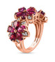 side view of rhodolite garnet and white zircon flower ring in 18k rose gold over sterling silver