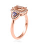side view of morganite tanzanite and white zircon ring in 18k rose gold over sterling silver