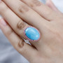 arizona sleeping beauty turquoise pink sapphire and zircon ring in 18k rose gold over sterling silver worn on a hand