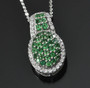 tsavorite garnet and zircon cluster pendant necklace in rhodium over sterling silver shown in a lifestyle photo