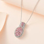 pink sapphire and zircon cluster pendant necklace in rhodium over sterling silver shown in a lifestyle photo