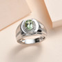 green tourmaline and moissanite gents ring in rhodium over sterling silver shown in a lifestyle photo
