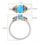 arizona sleeping beauty turquoise and tanzanite ring in 18k yellow gold and rhodium over sterling silver shown for size comparison