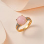 pink opal and moissanite ring in 18k yellow gold over sterling silver shown in a lifestyle photo