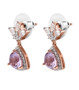 side view of rose de france amethyst and moissanite dangle earrings in 18k rose gold over sterling silver