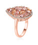 side view of pink tourmaline imperial topaz and moissanite pear cluster ring in 18k rose gold over sterling silver