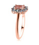 side view of cushion pink tourmaline and aquamarine halo ring in 18k rose gold over sterling silver
