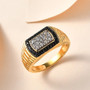 white zircon and black spinel gents ring in 18k yellow gold over sterling silver shown in a lifestyle photo