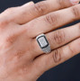 white zircon and black spinel gents ring in rhodium over sterling silver worn on a hand