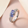 tanzanite and white zircon ring in rhodium over sterling silver shown in a lifestyle photo
