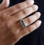 champagne diamond gents wedding ring in rhodium over sterling silver worn on a hand