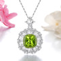 peridot and zircon halo pendant necklace in rhodium over sterling silver shown in a lifestyle photo
