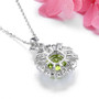 back view of peridot and zircon halo pendant necklace in rhodium over sterling silver